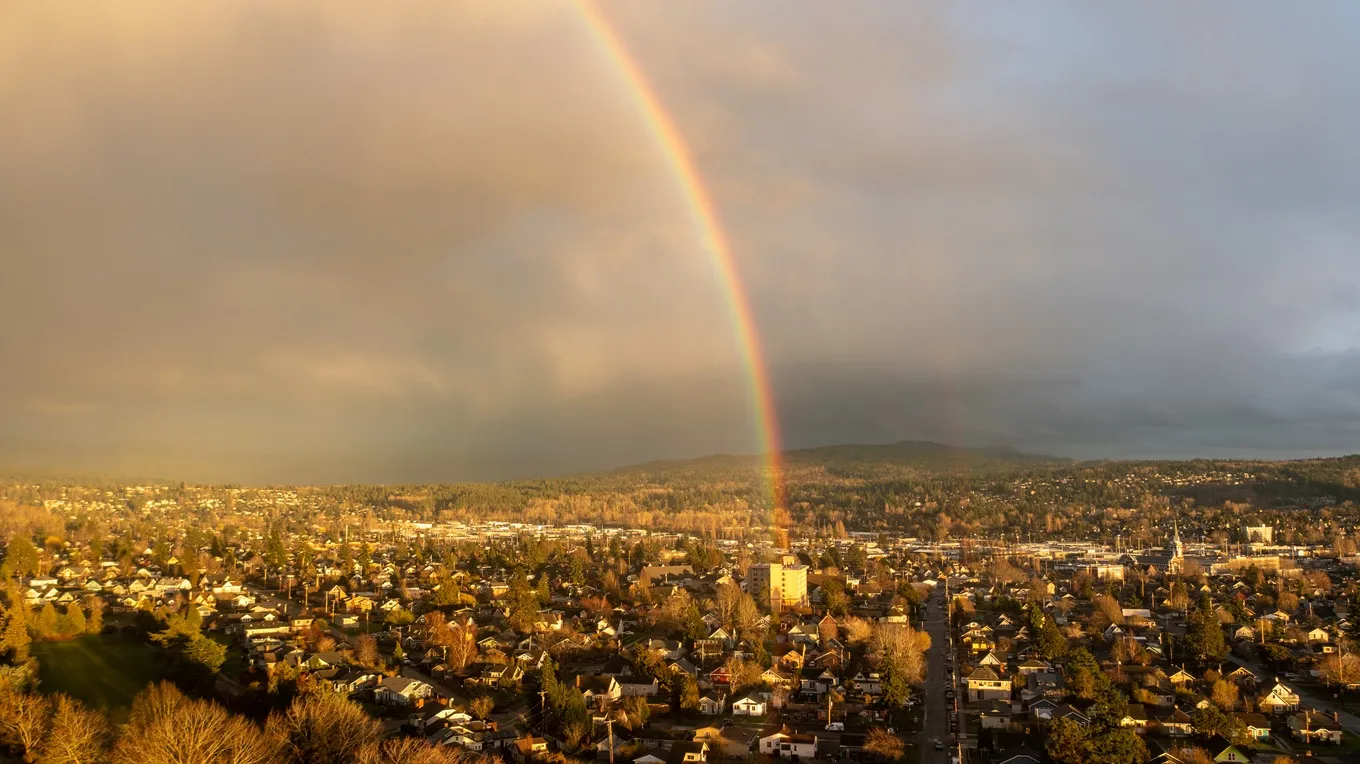 A rainbow arcing over the rooftops of Bellingham, Washington